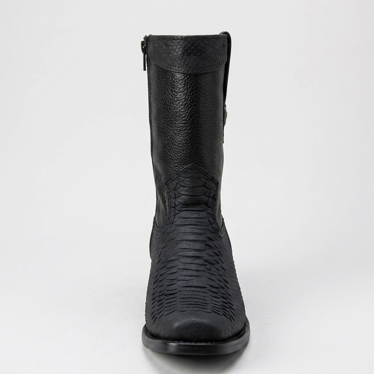 A single black leather ankle boot with a textured python-patterned lower section and a side zipper, shown from a front-facing perspective on a light gray background.