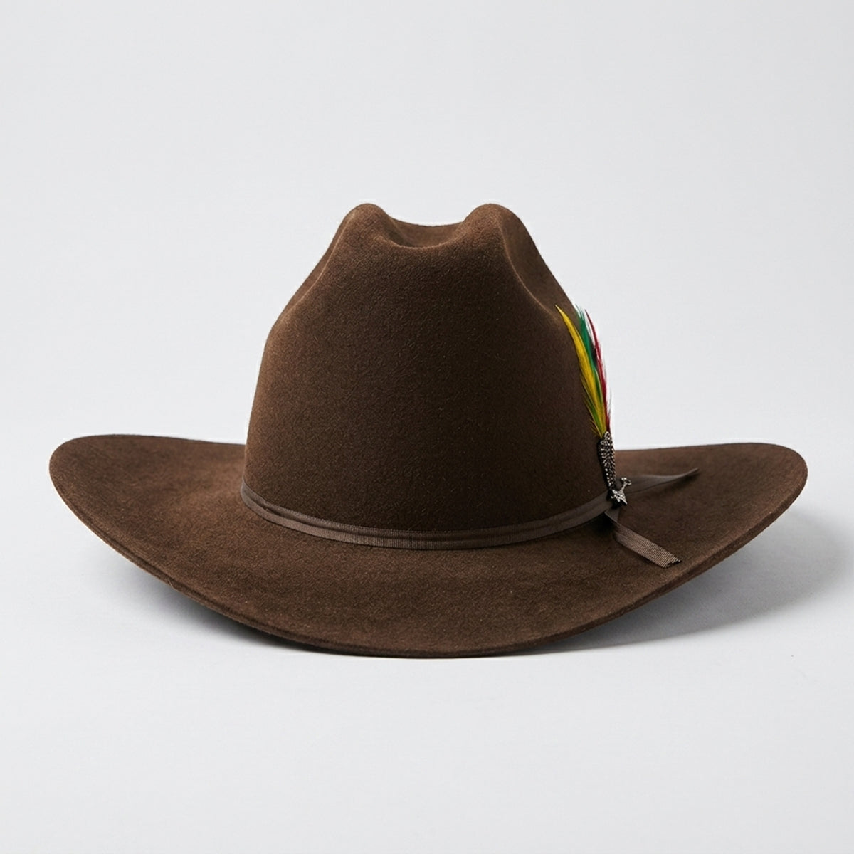 Stetson Rancher 6x brown felt western hat with a colorful band on a light gray background.