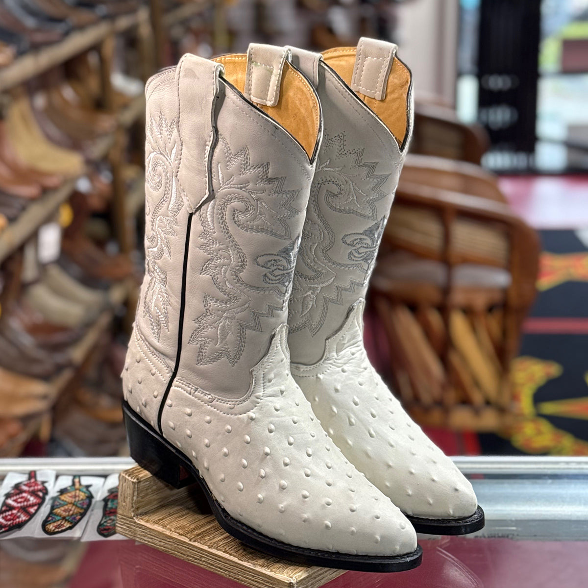 Winter White ostrich print boots