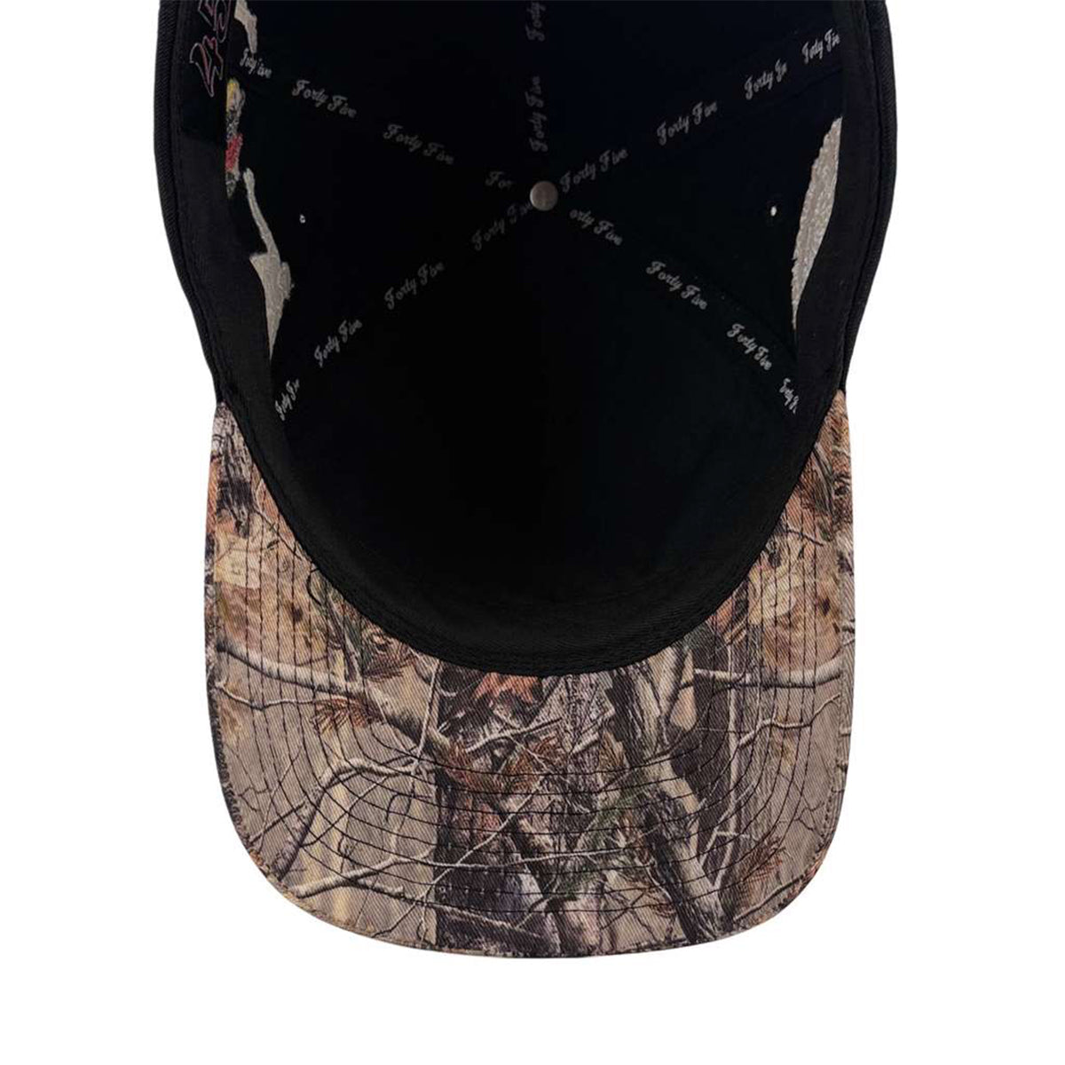 Cap with black brim and camouflage pattern on a white background.