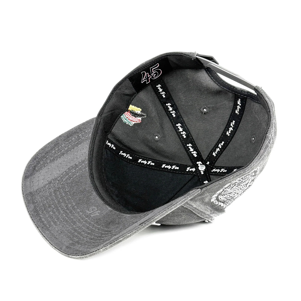A washed black baseball cap shown from an overhead angle, displaying its black interior with white 'TeeTime' text on the straps, a white '45' on the inner crown, and a white embroidered logo on the side.