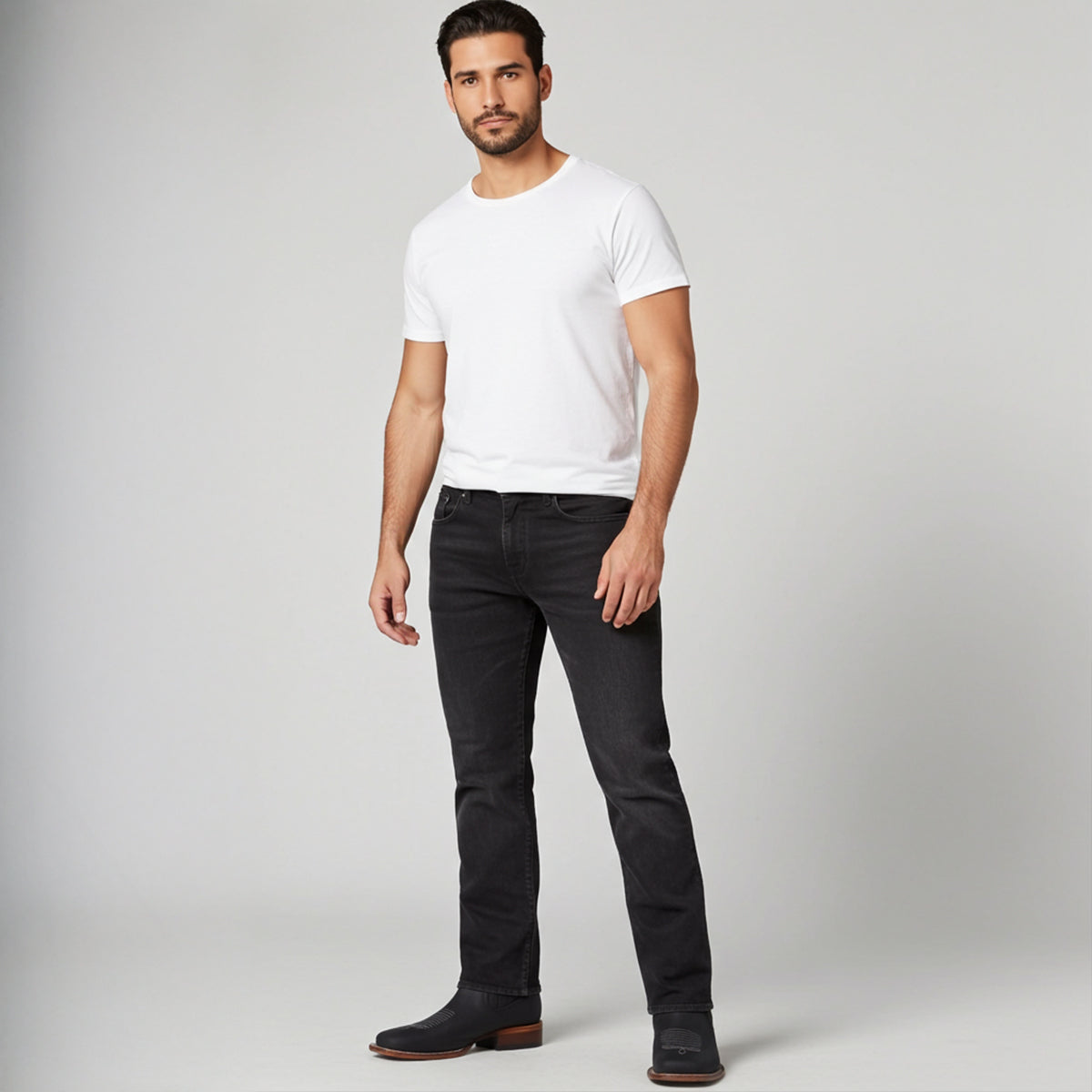 Man wearing black square toe black Chelsea boots