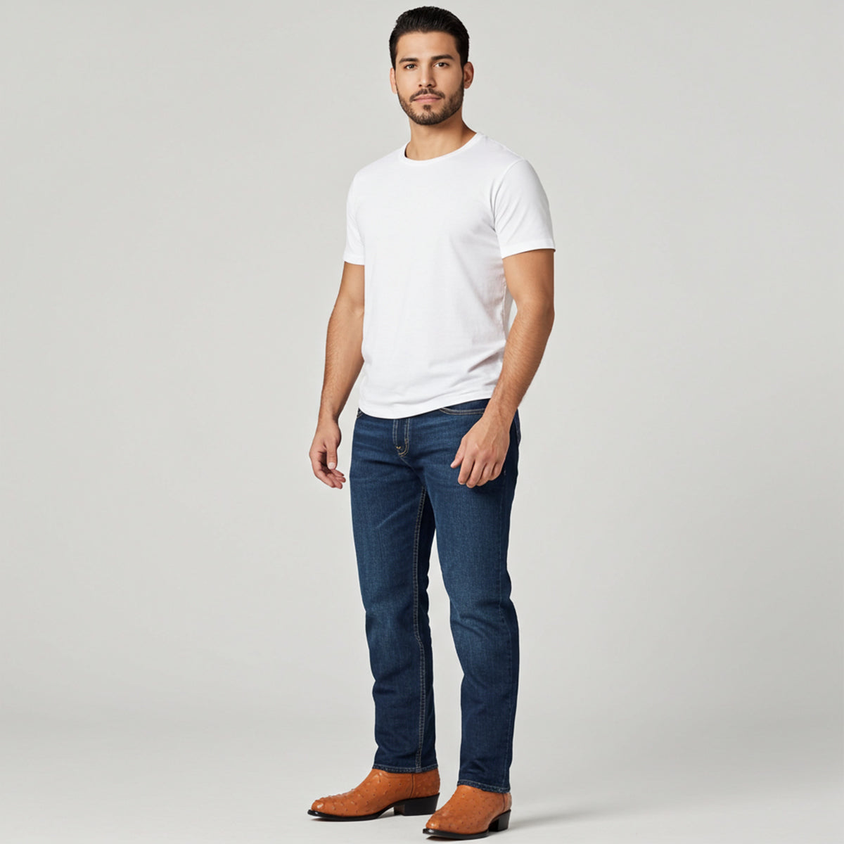 Man wearing cognac ostrich print cowboy boots