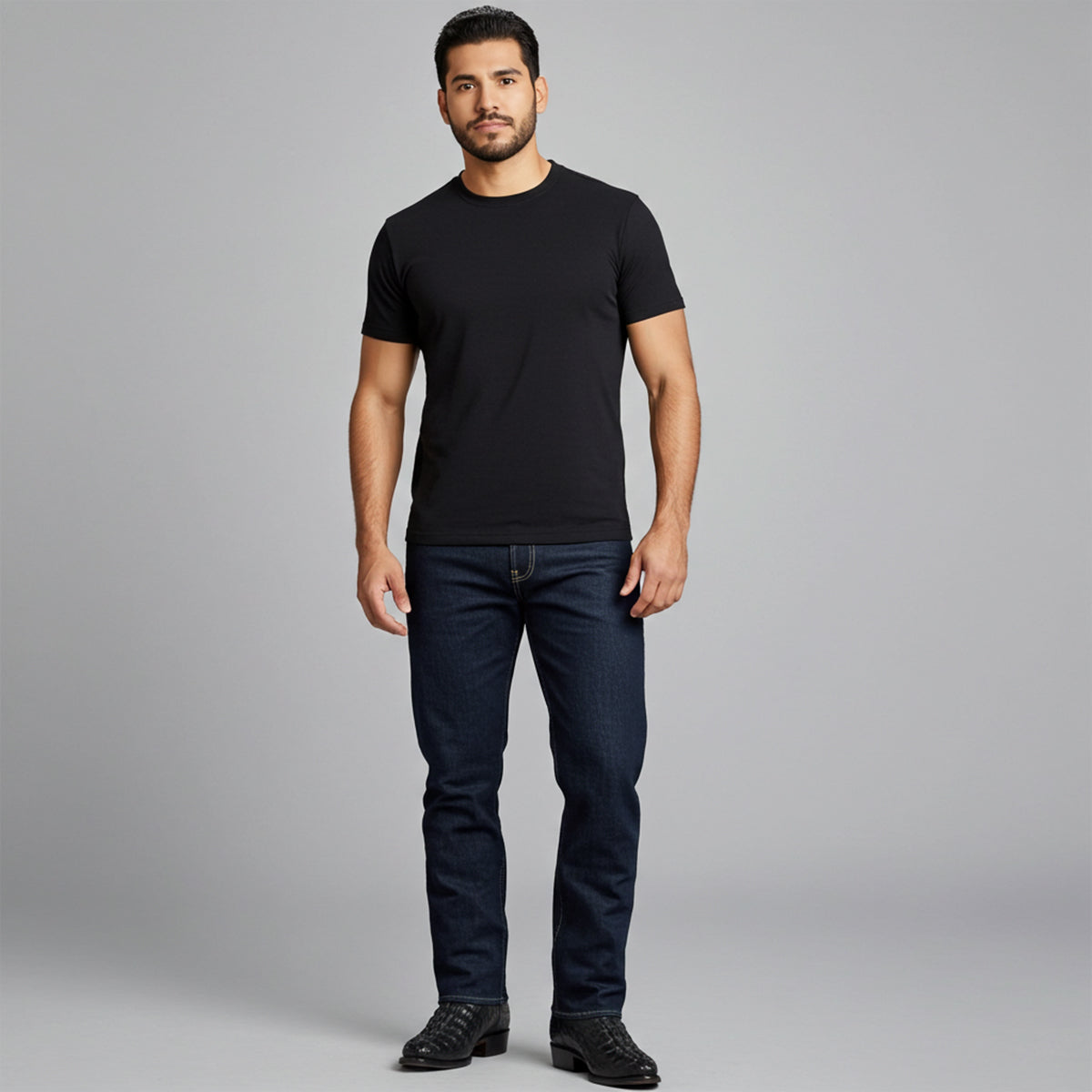 Man wearing black crocodile print cowboy boots