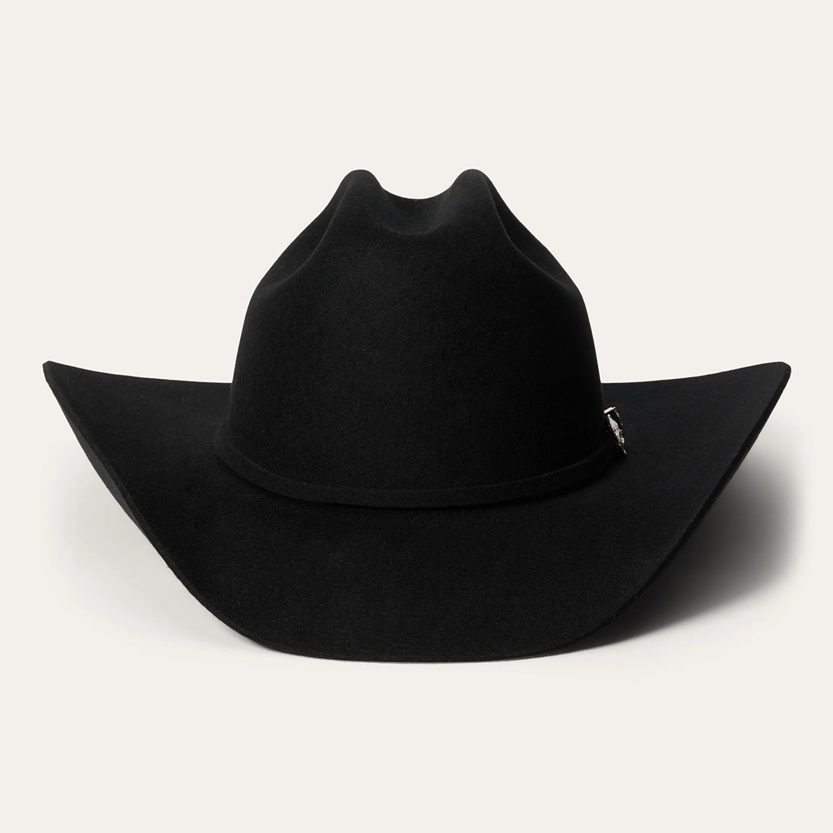 Straight-on front studio view of the Stetson Corral 4X black buffalo felt cowboy hat highlighting the symmetrical cattleman crown crease and silver buckle accent.