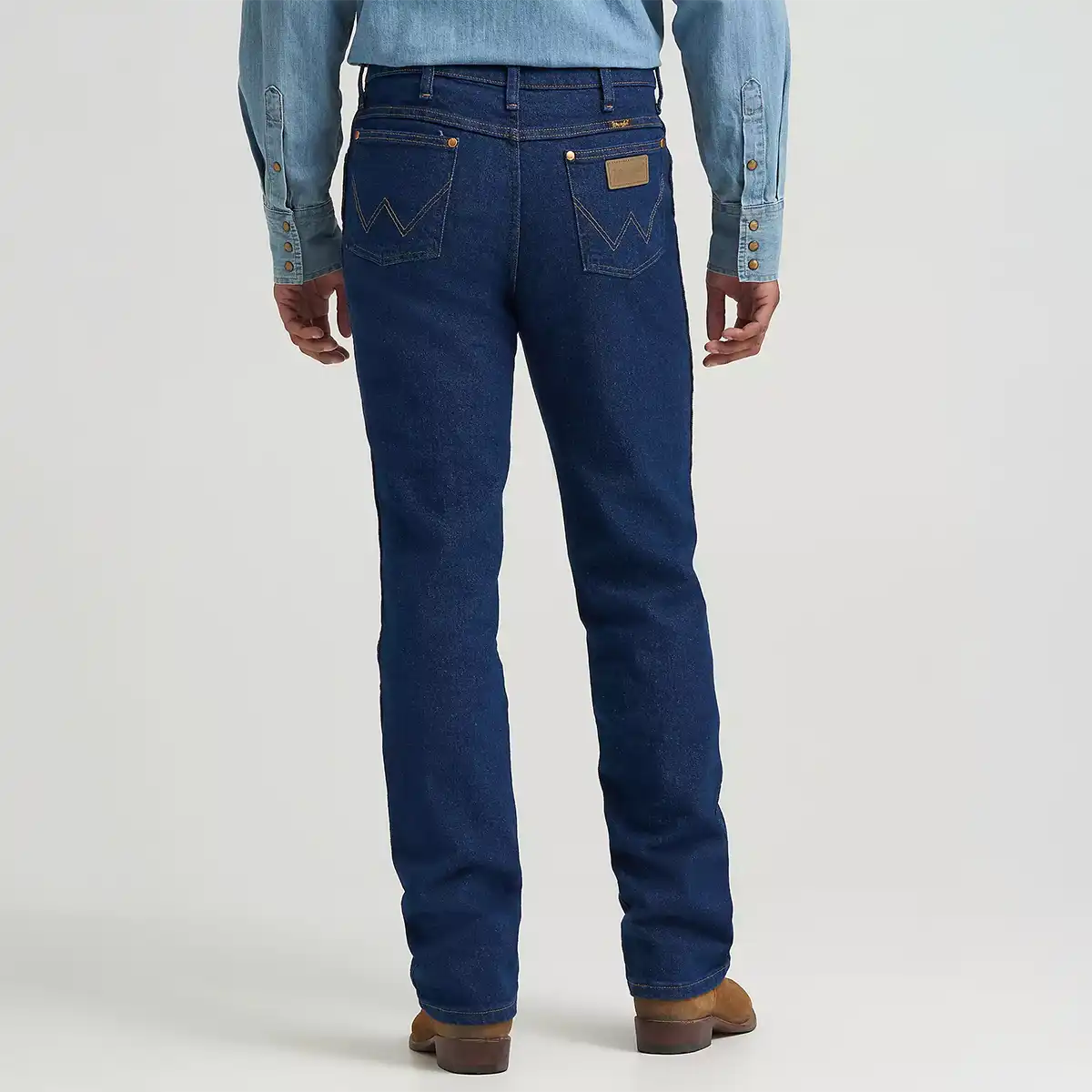 Rear view of Wrangler Men's navy stretch slim fit jeans showing the Neolite back patch and signature 'W' pocket stitching.