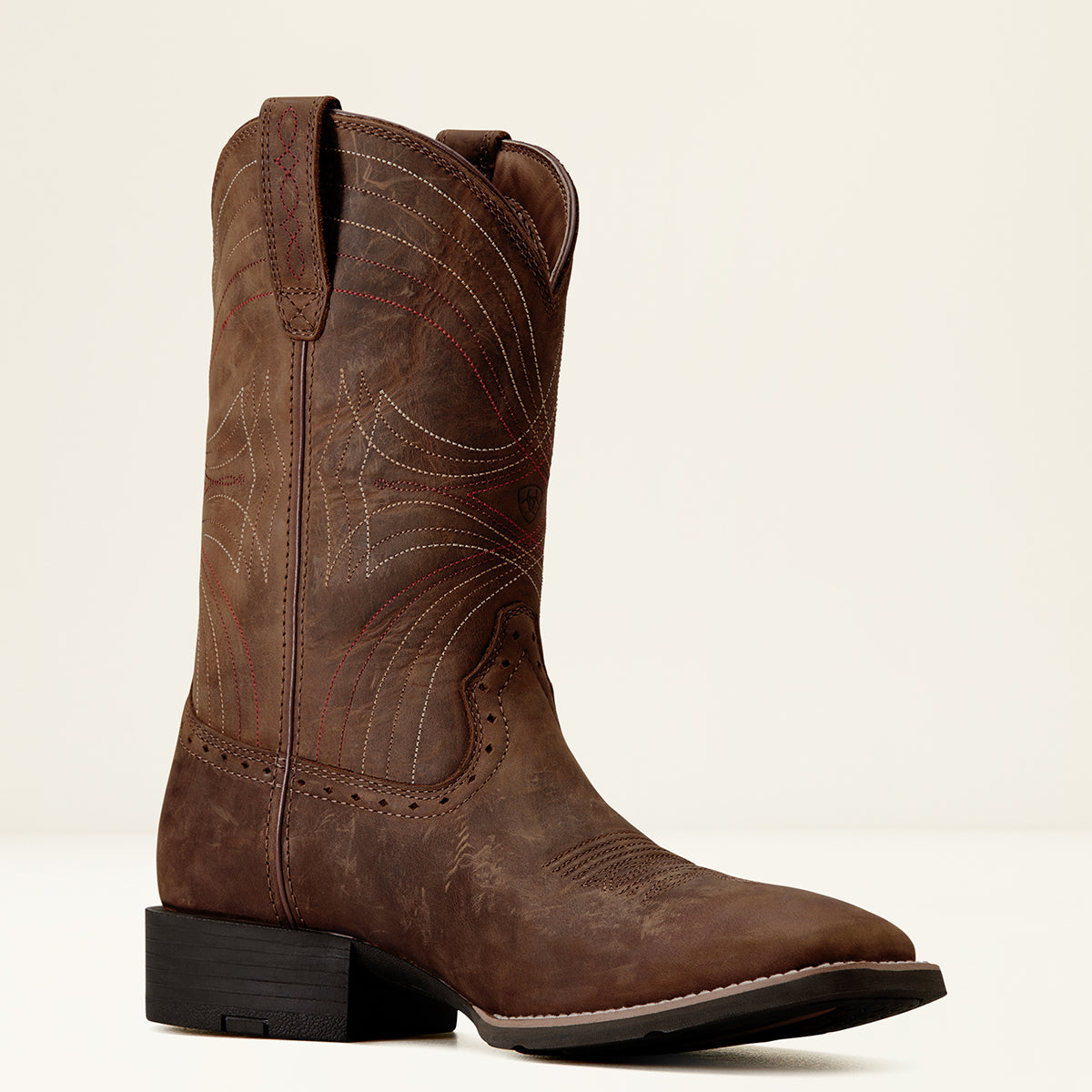 Profile view of the Ariat Men's Sport Distressed Brown full-grain leather Western boot showing the wide square toe and welt stitching.