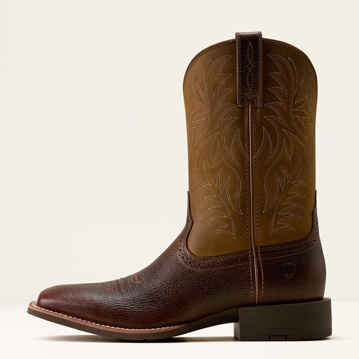 Side profile of Ariat men's brown  square toe western boot.