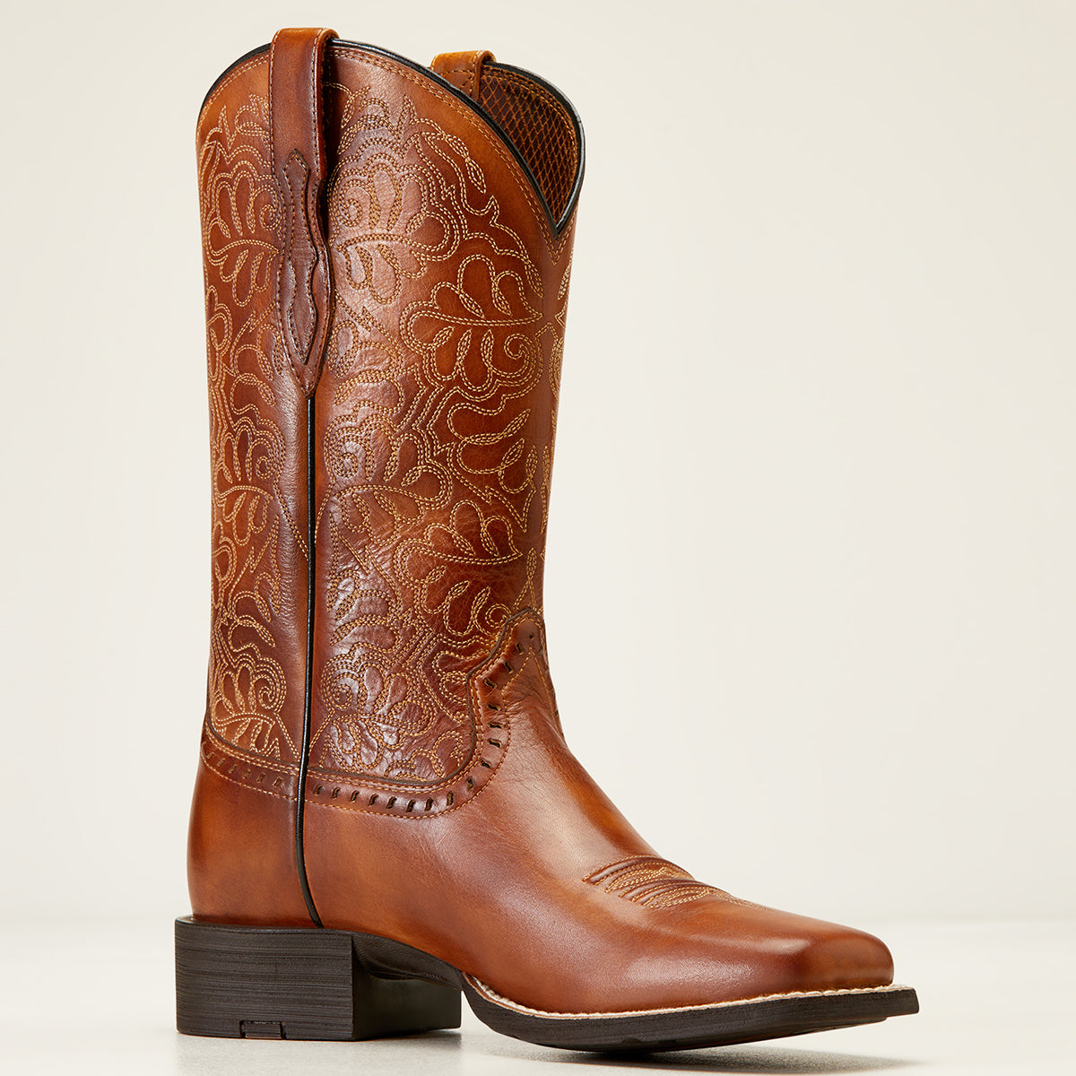 Ariat Women's Round Up Remuda Naturally Rich full-grain leather Western boot featuring a wide square toe, ornate floral shaft stitching, and horseman heel.
