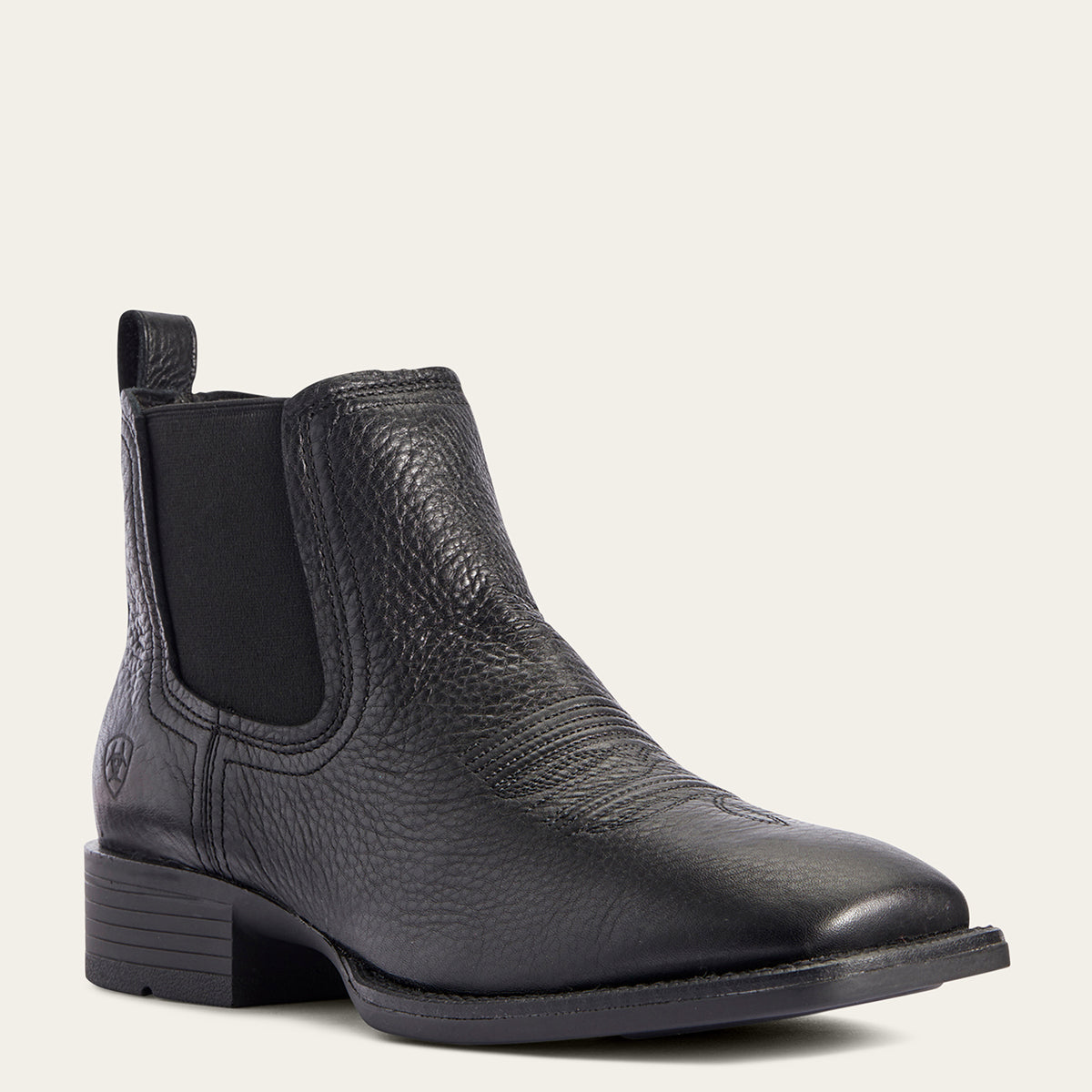 Ariat Men’s Booker Ultra Chukka Boot in black pebbled full-grain leather featuring elastic side panels, a square toe, western stitch detail, and a Duratread outsole.