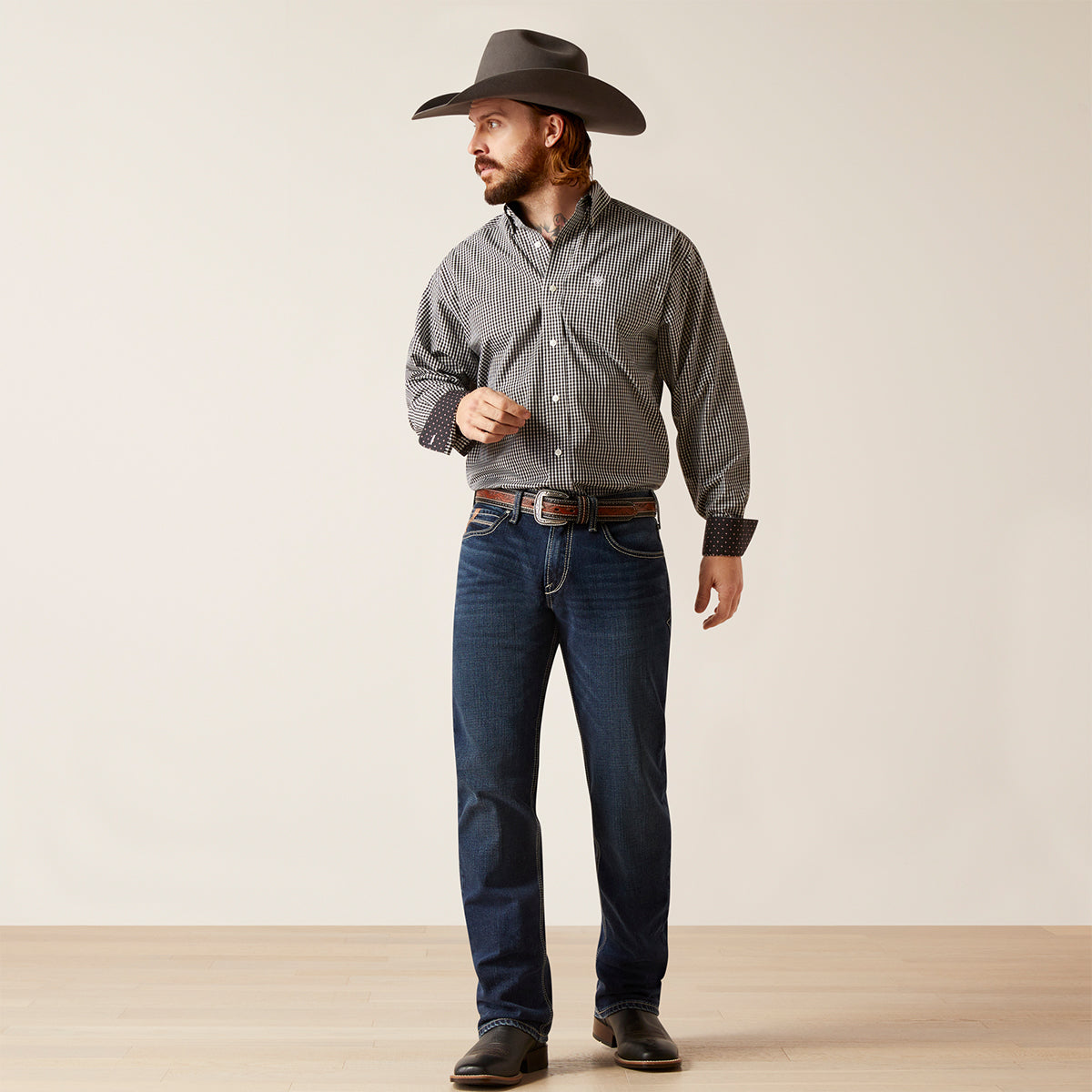 Man wearing Wrinkle Free Ved Classic Fit Ariat Shirt