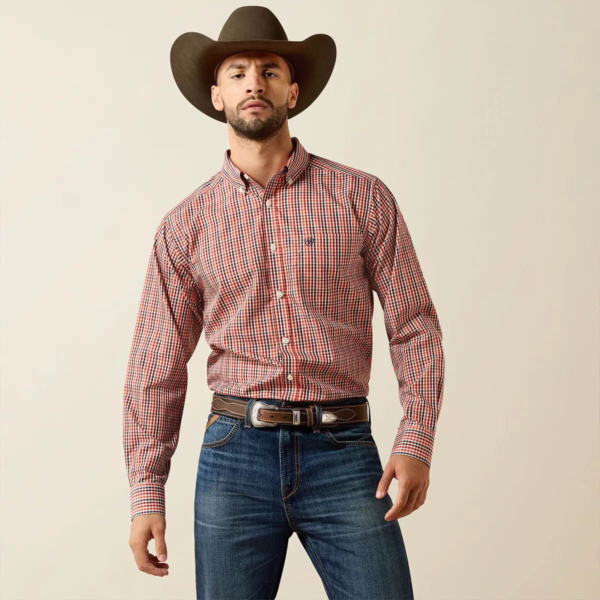 Front studio view of the male model wearing the Ariat Walter Ketchup small check shirt highlighting the button-down collar and chest pocket.