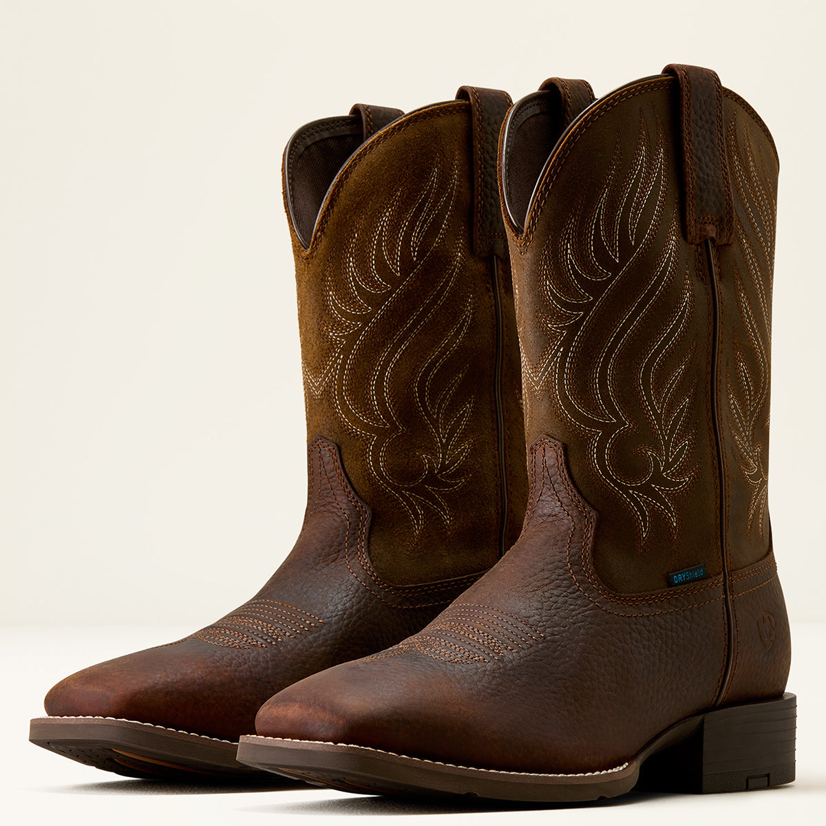 Ariat Men’s Sport Riggs Waterproof Western Boots in Copper Kettle full-grain leather featuring a wide square toe, dark brown shaft with four-row stitching, and a Duratread outsole.