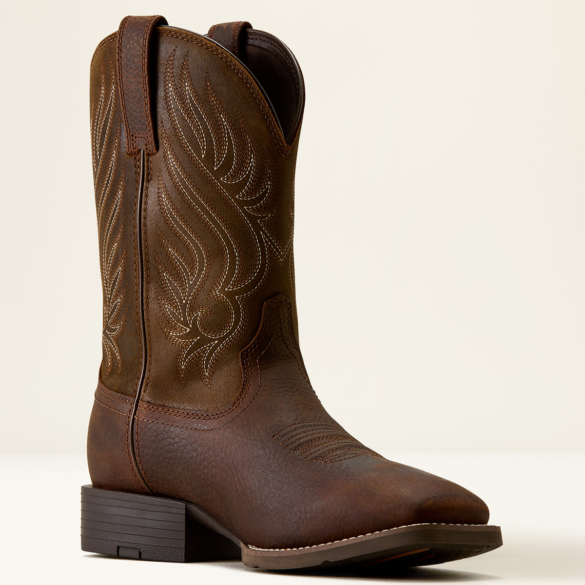 Ariat Men’s Sport Riggs Waterproof Cowboy Boot in Copper Kettle full-grain leather featuring a wide square toe, dark brown shaft with four-row stitching, and a Duratread outsole.