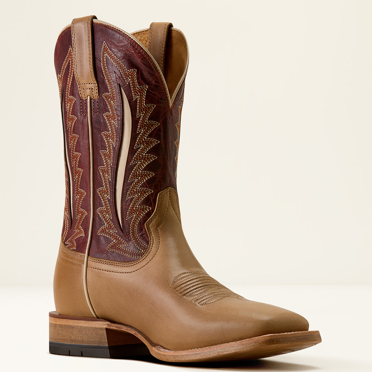 Ariat Men’s Gage Wide Square Toe Cowboy Boot in Faded Carmel leather with a Fired Brick upper shaft featuring six-row stitching and cream inlay details.