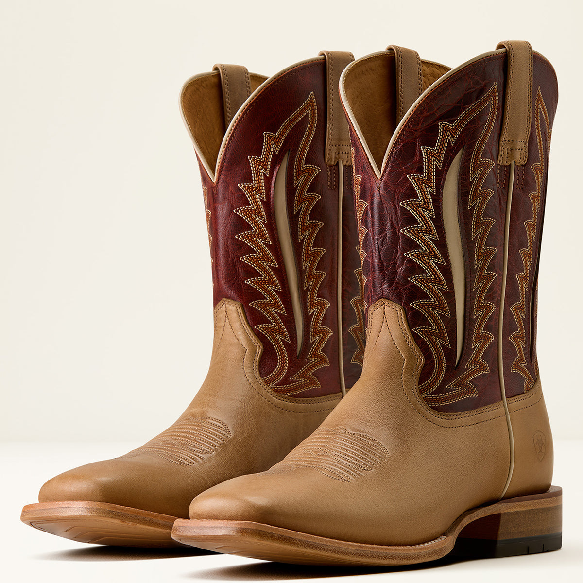 Ariat Men’s Gage Wide Square Toe Cowboy Boots in Faded Carmel leather with a Fired Brick upper shaft featuring six-row stitching and cream inlay details.