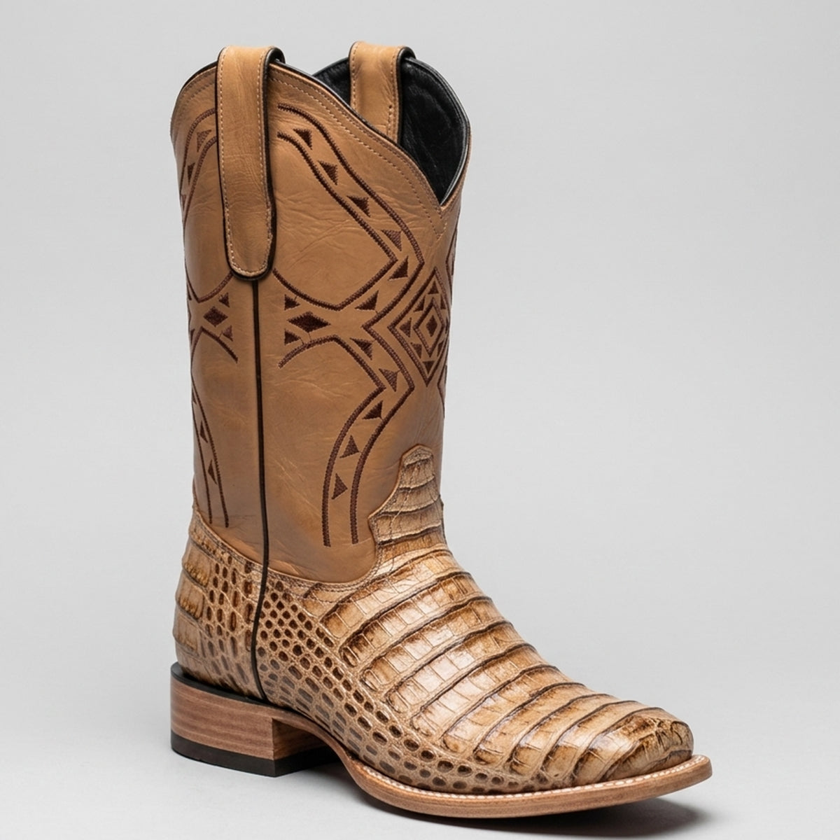 White Diamonds men's oryx tan caiman print cowboy boots with a square toe profile and geometric stitched details on the leather shaft.
