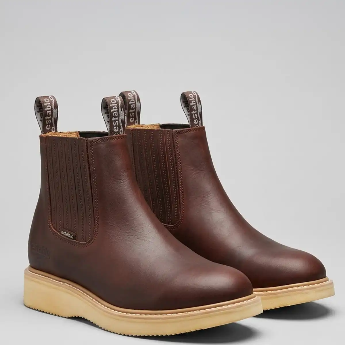 Studio pair view of the Establo Men's brown short pull-on Chelsea work boots.