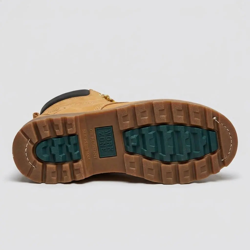 Bottom view of the Work Zone 611 rubber outsole showing the dual-color green and tan oil-resistant slip-resistant tread design.