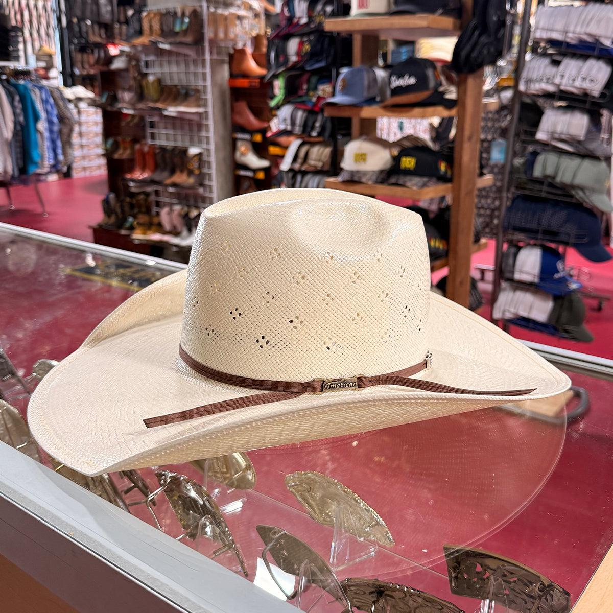 Side view of American Hat Company 8120 minnick straw cowboy hat.