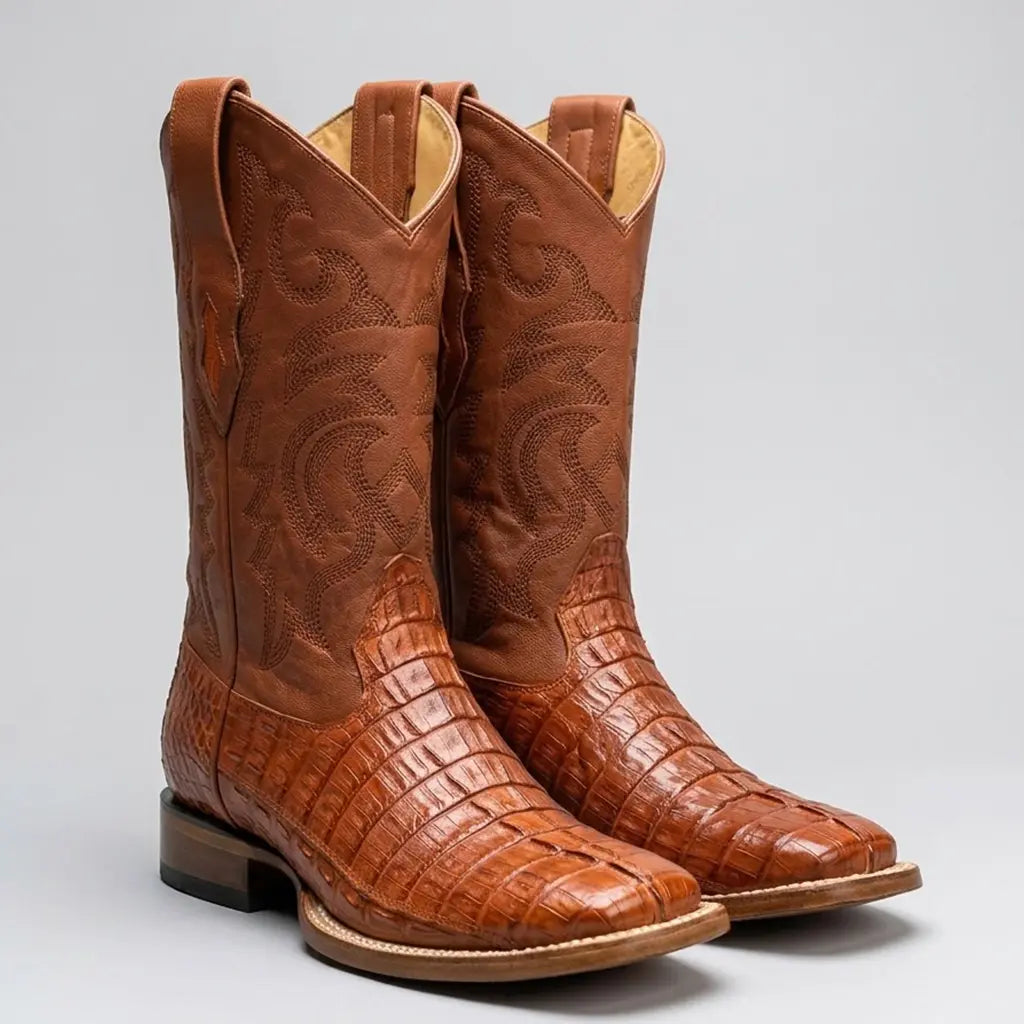 Studio pair view of the Los Altos Men's cognac caiman tail square toe boots highlighting both boots from a three-quarter perspective.