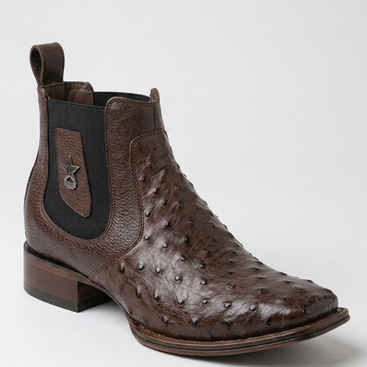 Los Altos men's brown genuine full quill ostrich leather Chelsea ankle boot featuring a square toe, black elastic side goring, and a silver metal star accent.