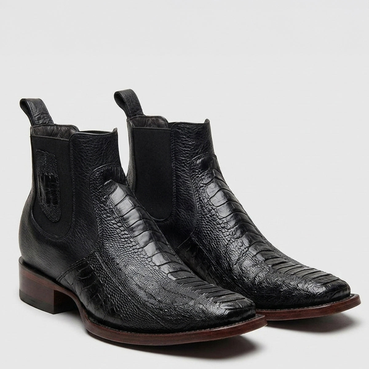 Los Altos men's black genuine ostrich leg leather Chelsea ankle western boots featuring a distinct scaled texture, a square toe, and black elastic side panels.