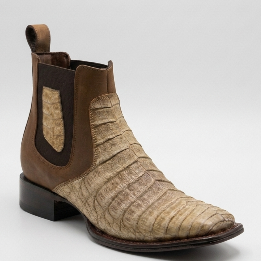A pair of Los Altos men's sahara stone tan genuine caiman belly leather Chelsea ankle boot featuring a tiled tile scale pattern, brown elastic side goring, and a square toe.