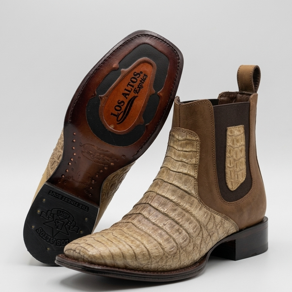 A pair of Los Altos Boots western ankle boots, featuring a tan and brown alligator-textured leather vamp, brown leather side panels, and black elastic side gore. One boot is shown from the side profile, and the other is turned to show the sole with the brand logo 'Los Altos Boots'.