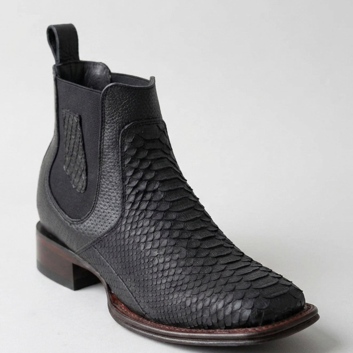 Los Altos men's black genuine python leather Chelsea ankle boot featuring a matte textured snakeskin pattern, black elastic side goring, and a square toe.