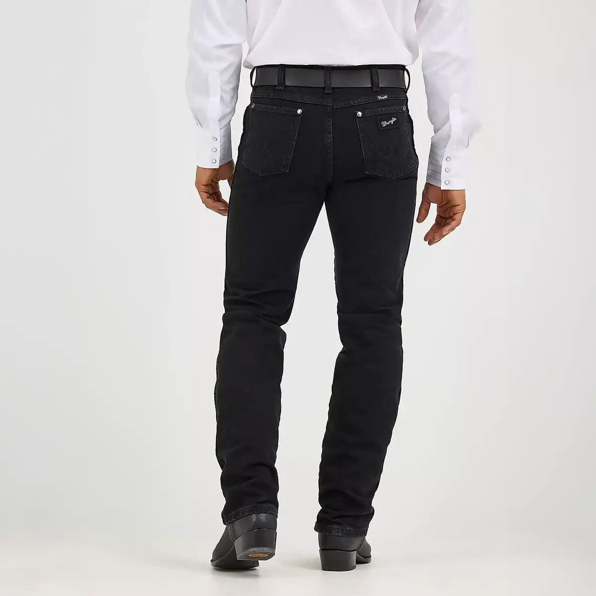 Back view of the Wrangler black slim fit jeans highlighting the signature W pocket stitching, riveted back pockets, and black and silver Wrangler logo patch.