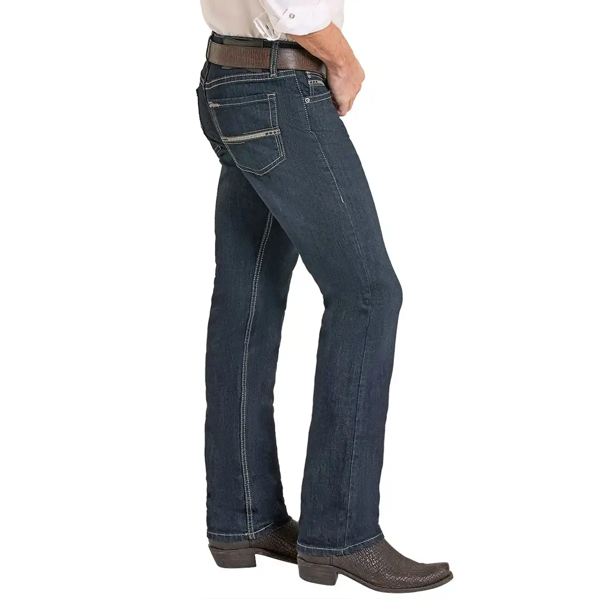Side view of a man wearing Rock & Roll Denim Revolver dark wash slim straight jeans with Western belt and cowboy boots.