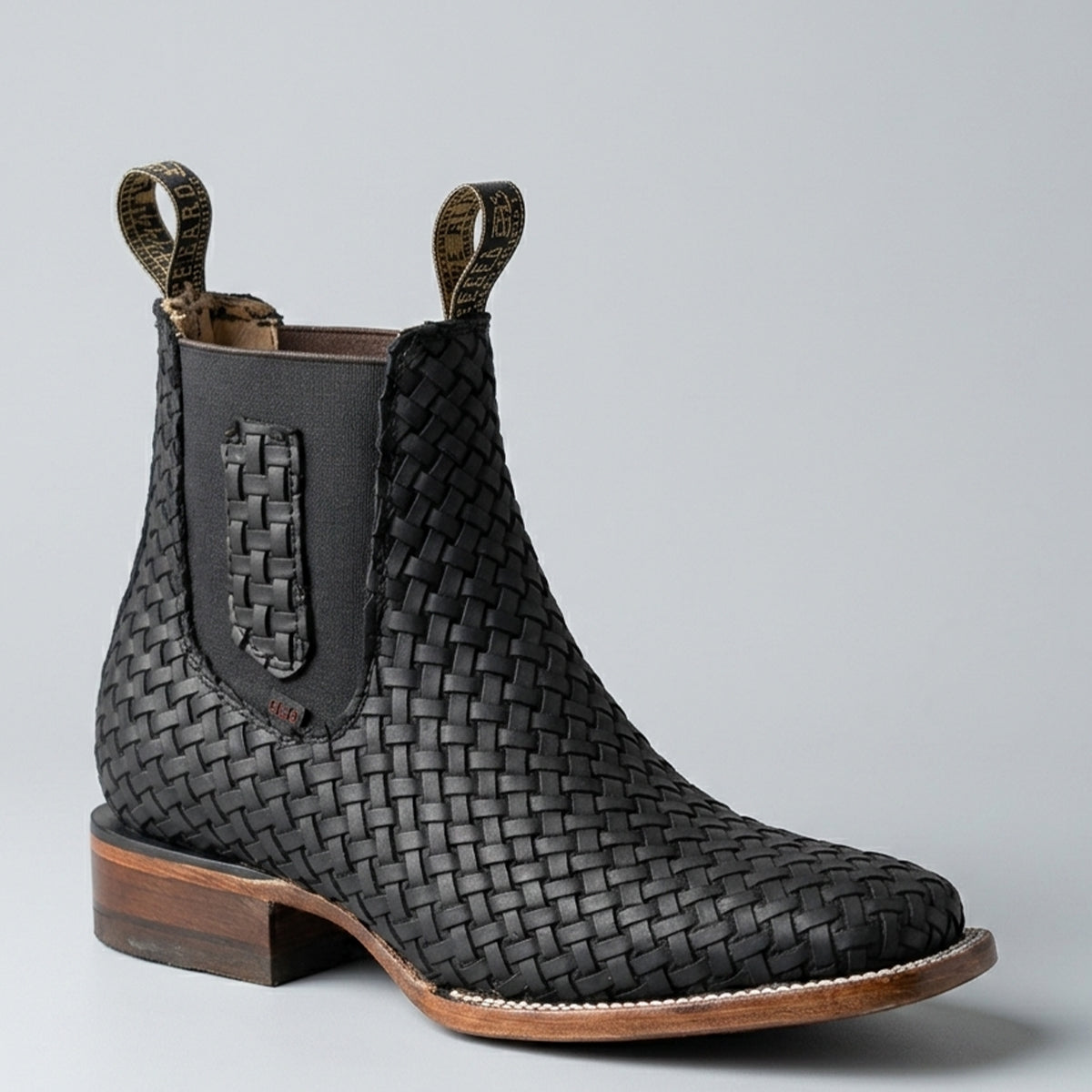 Men's black Petatillo braided short Chelsea square toe boot.