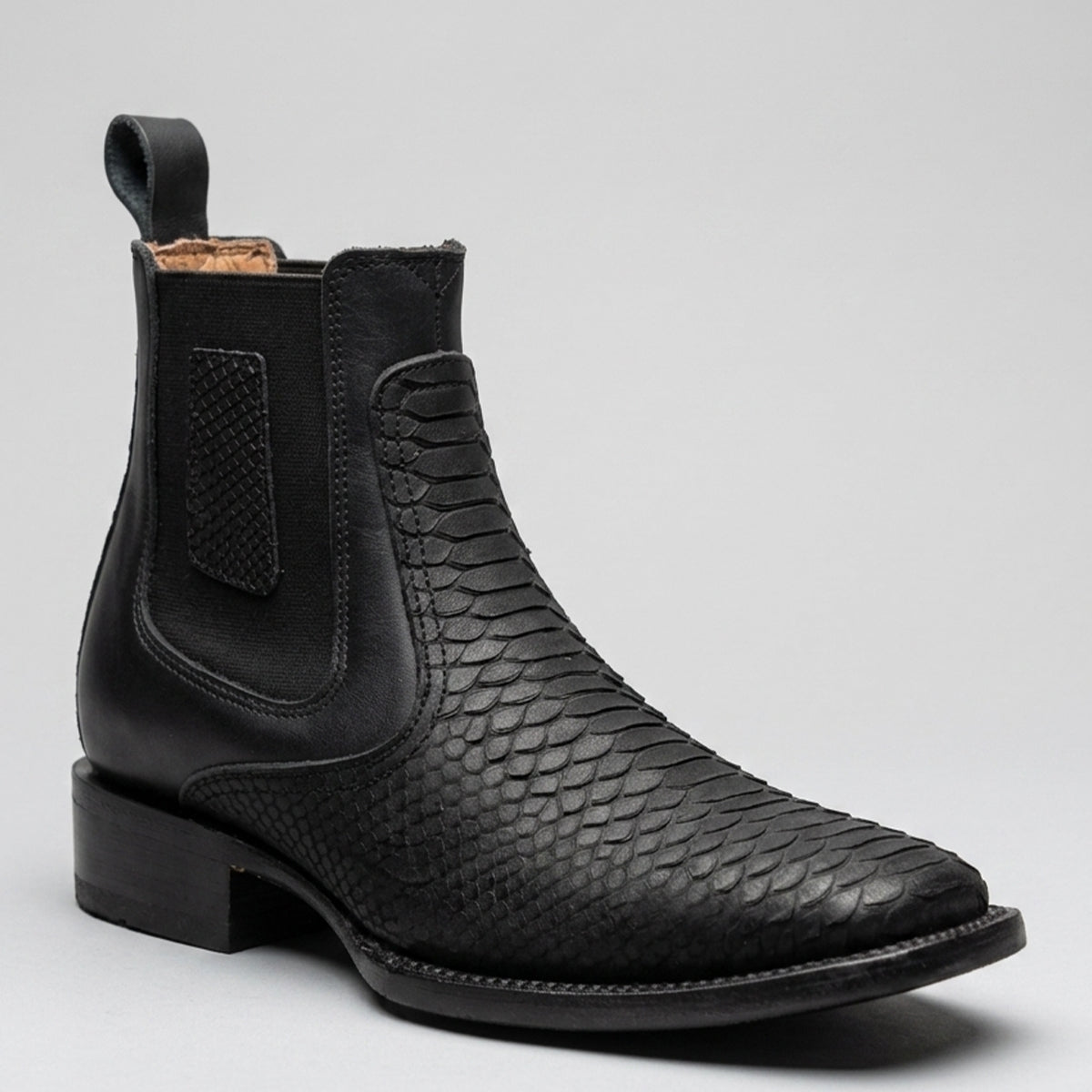 Hooch men's black python snake print Chelsea boot square toe profile.