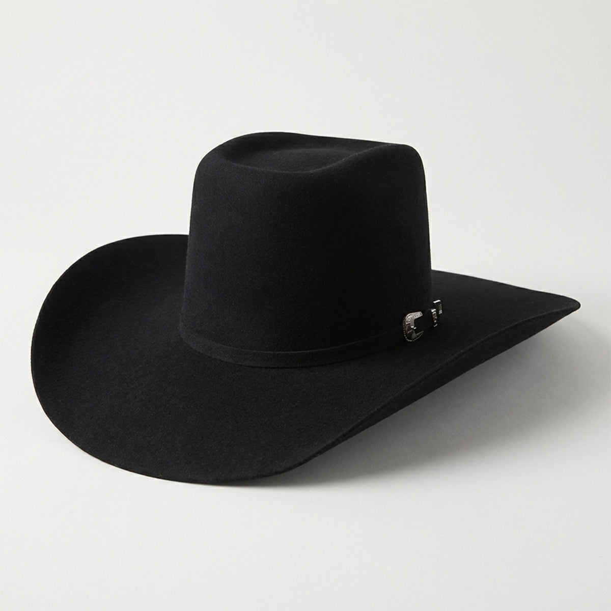 Cuernos Chuecos black brick crown cowboy felt hat.