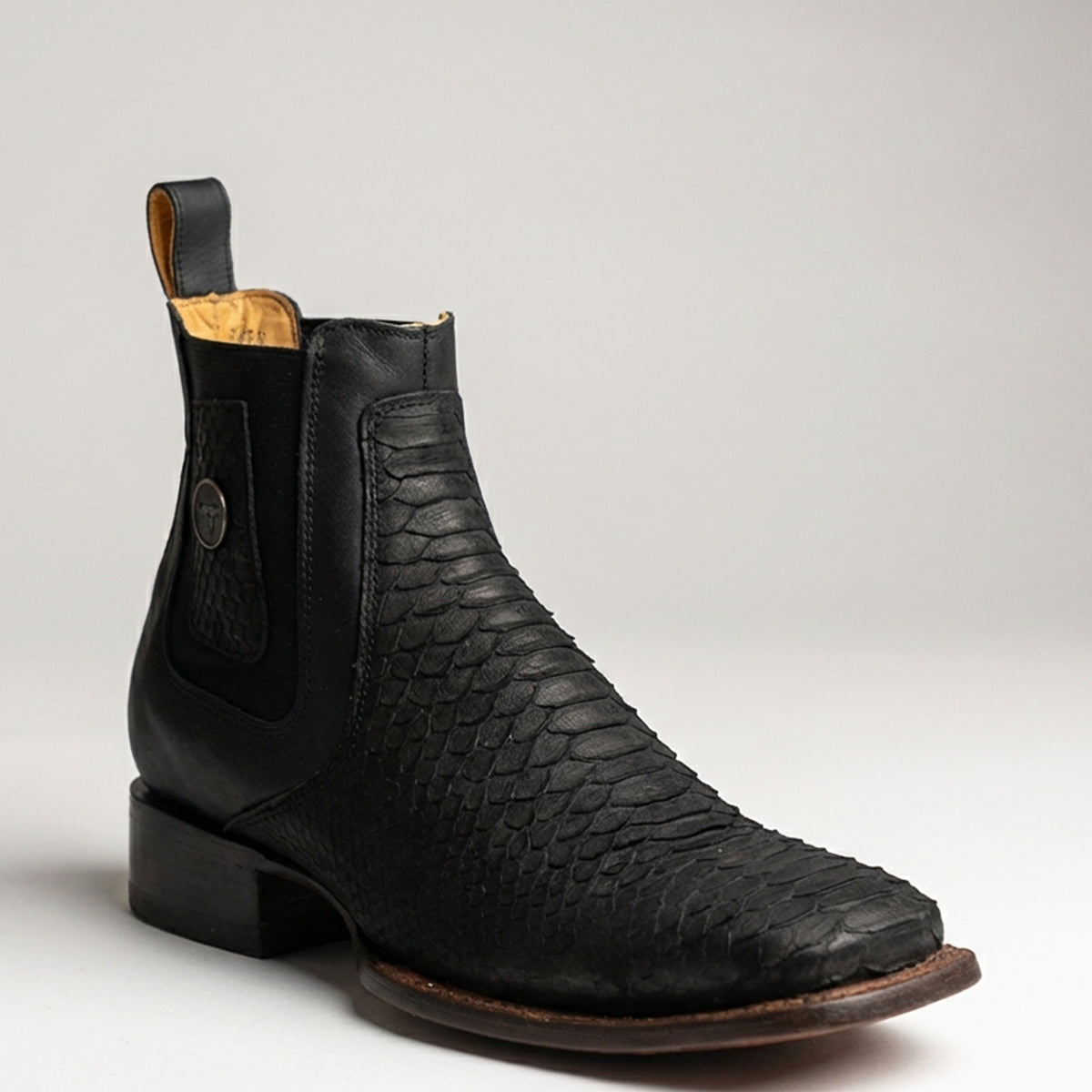 Hooch men's black python snake print Chelsea boot square toe profile.
