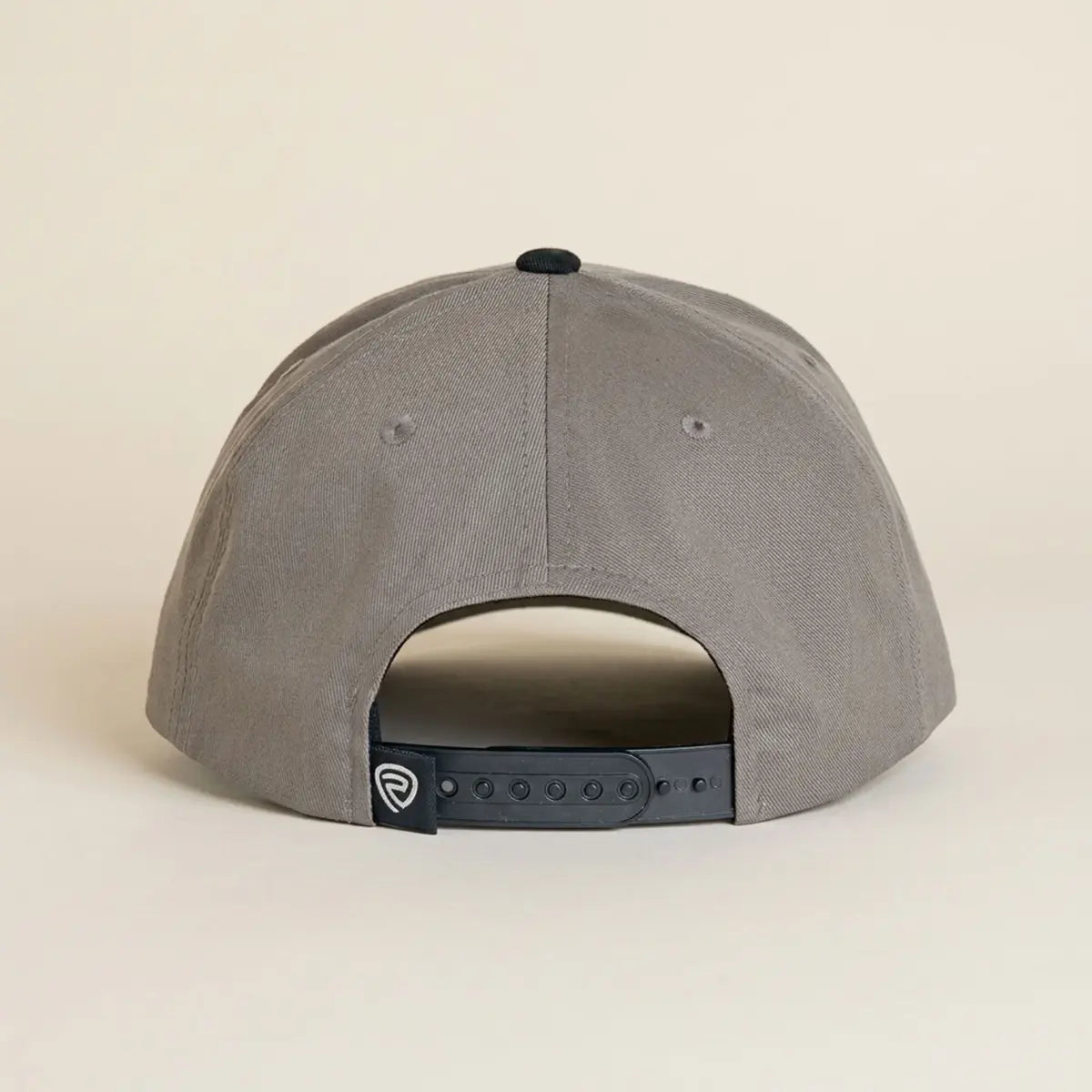 Back view of the Rock & Roll Denim grey cotton cap displaying the full fabric backing and 7-post snapback closure with brand logo tag.