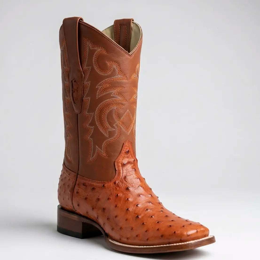 Three-quarter studio profile of the Los Altos Men's Cognac Full Quill Ostrich Western boot showcasing the wide square toe, 11-inch embroidered shaft, and raised quill texture.