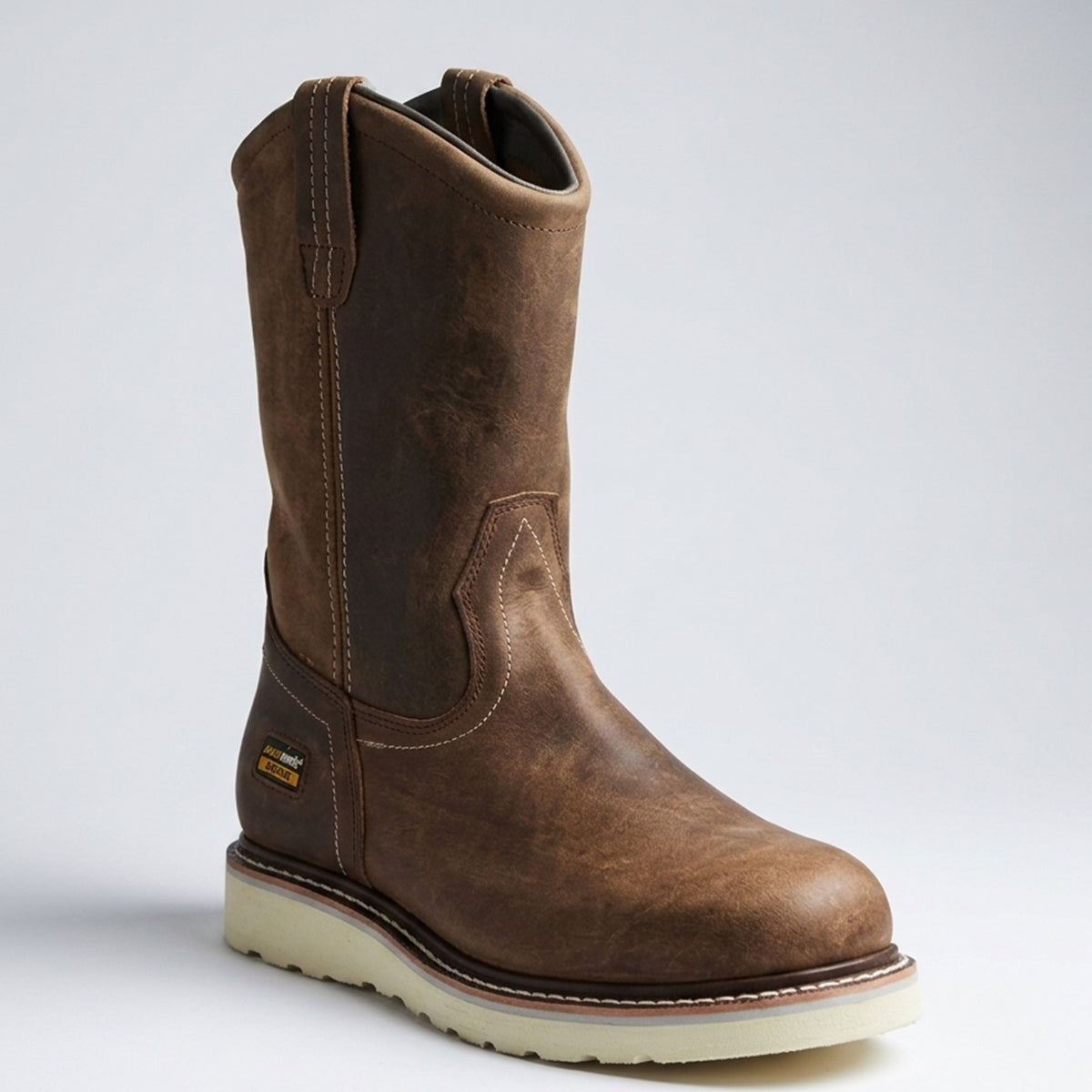 Overwork men's pull-on western work boots in distressed crazy horse brown leather featuring a round toe and a cream-colored flat wedge outsole.