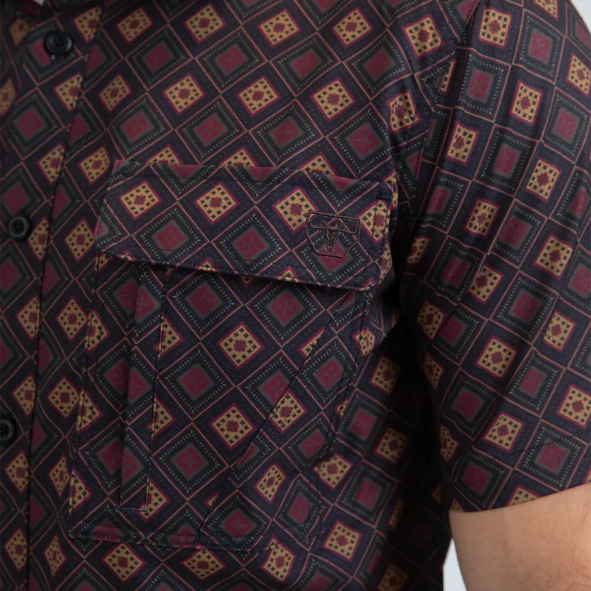 Close-up shot of the Platini black micro-diamond shirt detailing the pocket flap, snap button, geometric grid print, and embroidered logo.