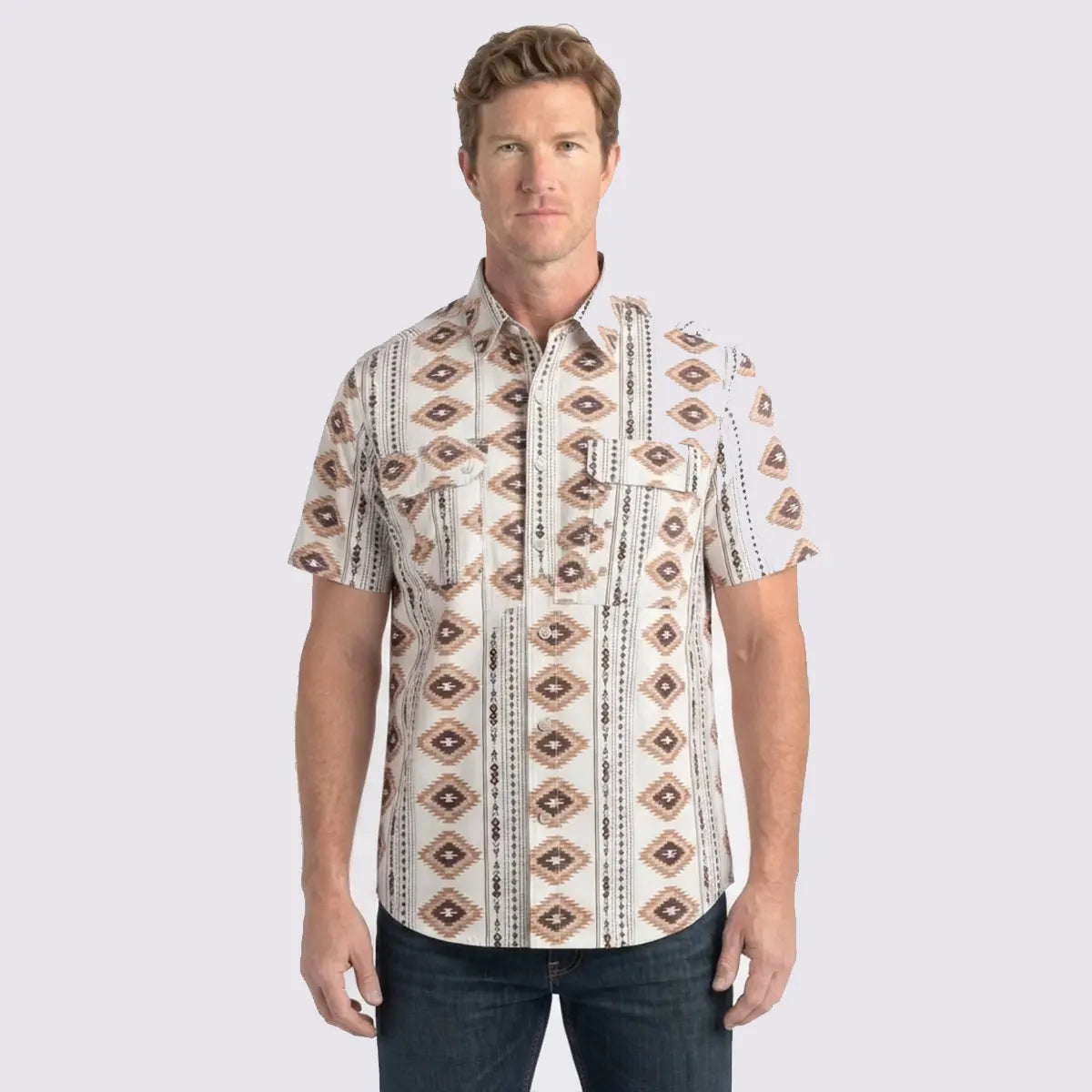 Front studio view of a male model wearing the Platini Men's beige diamond tribal short sleeve Western performance shirt with dark jeans.