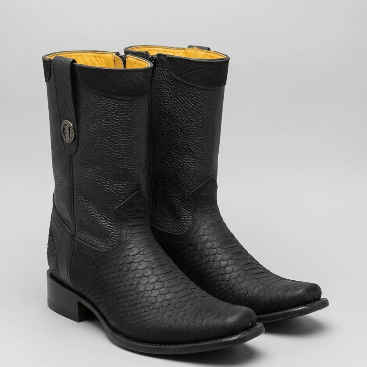 La Sierra Men's black snake print western boots with python embossed foot, semi-square toe, side pull strap with metal emblem.