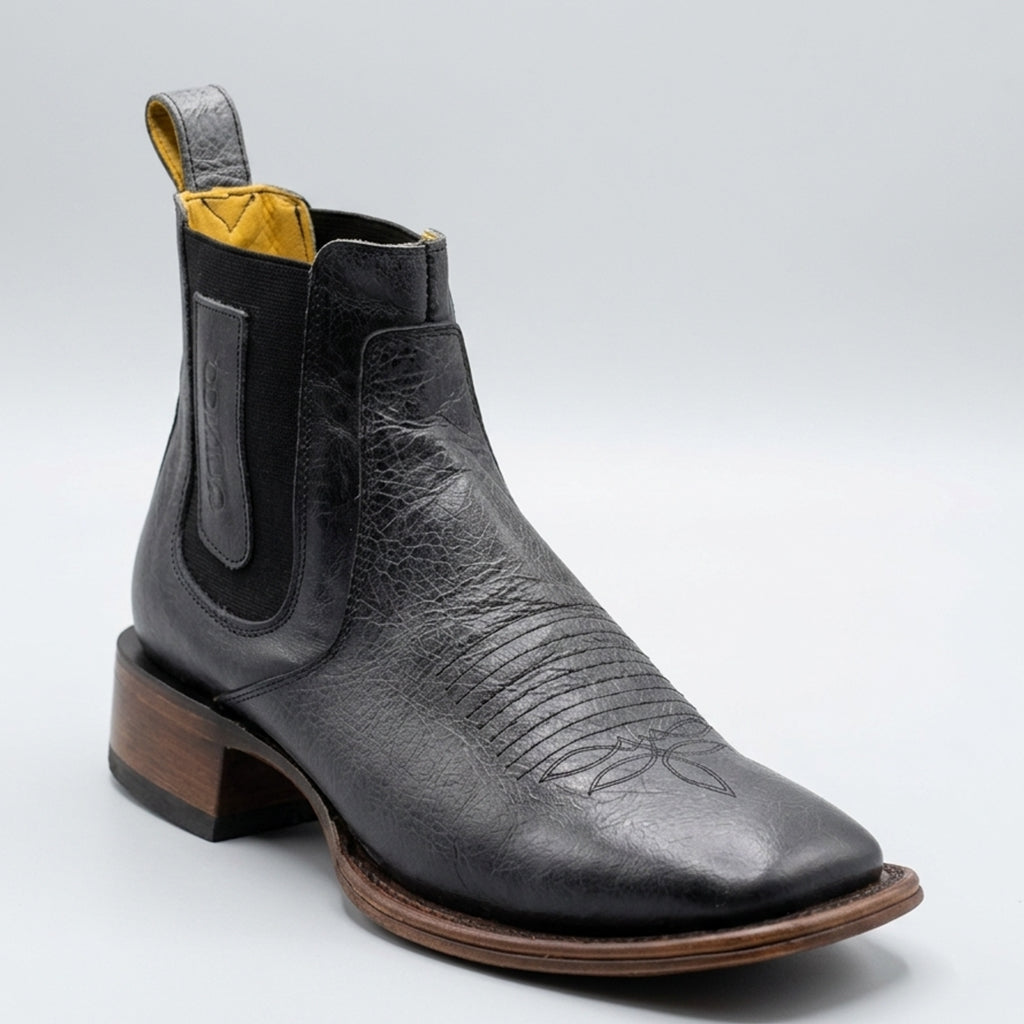 Quincy men's black leather western Chelsea boot featuring a classic bug stitch on the vamp, a wide square toe, black elastic side goring.