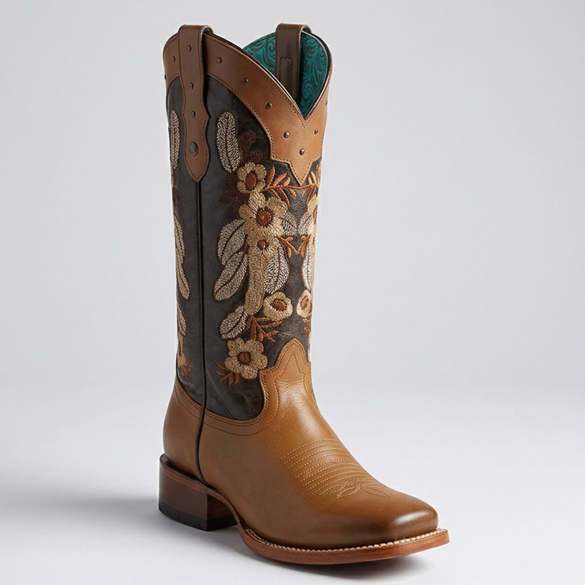 Quincy women's brown square toe cowboy boot with floral embroidery on a white background.