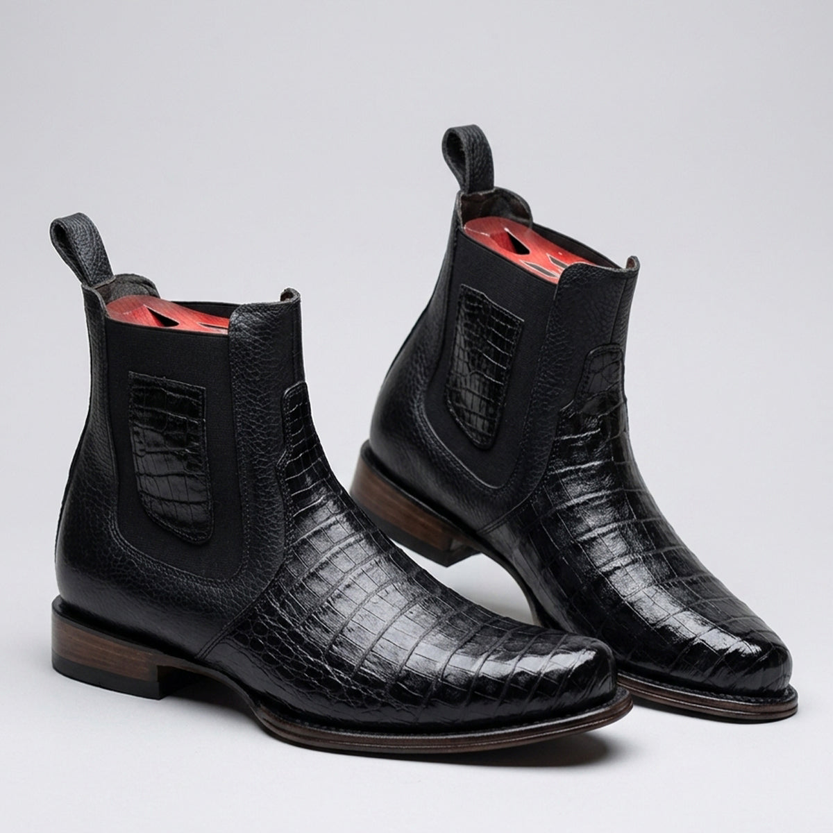Vestigium Milan men's black genuine caiman belly leather Chelsea boots featuring a classic R toe, black elastic side goring, and a leather pull tab.