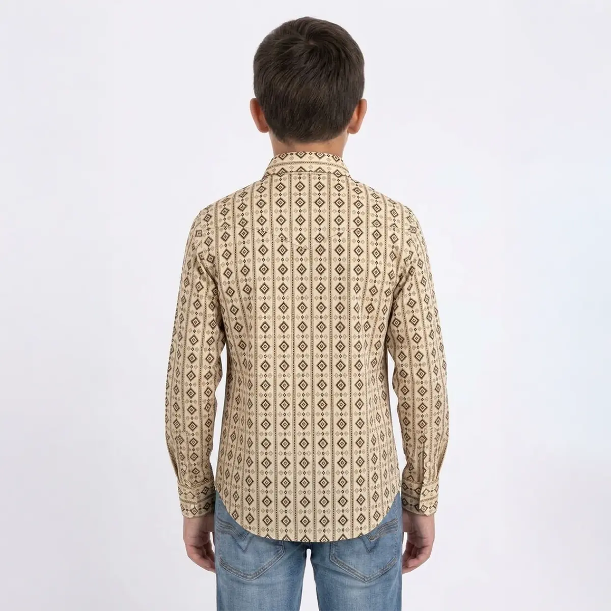 Rear studio view of the boy displaying the back Western yoke and vertical Aztec diamond stripe pattern on the Platini kids shirt.