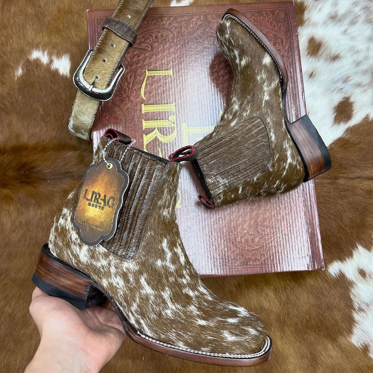 Lirac women's brown hair-on hide square toe boots.