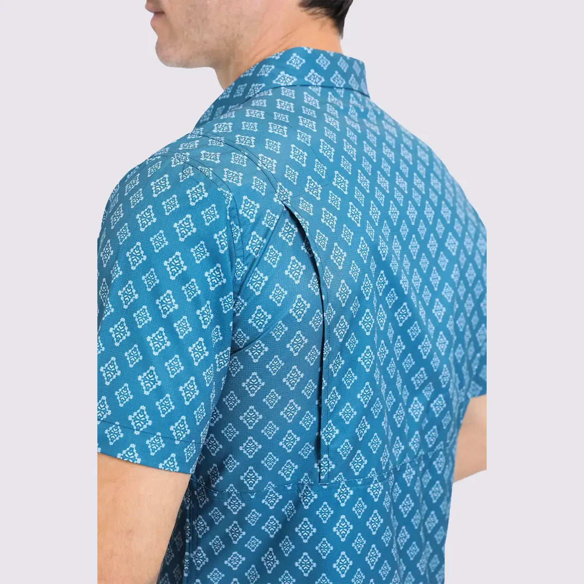 Close-up back view of the Platini blue Aztec shirt highlighting the back yoke ventilation flap and technical mesh lining.