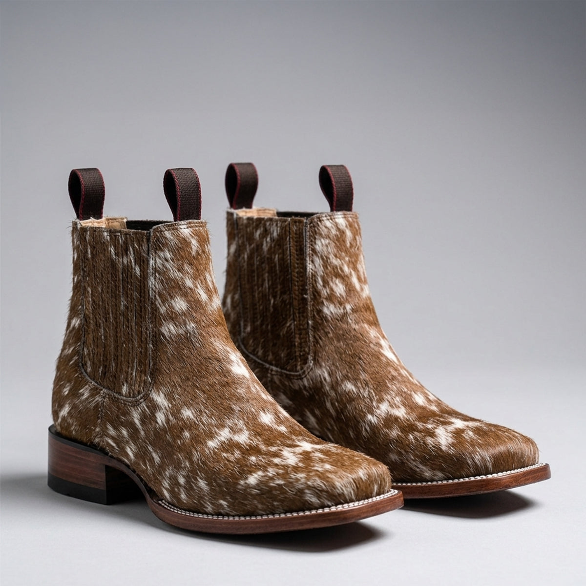 Lirac women's brown hair-on hide square toe booties.