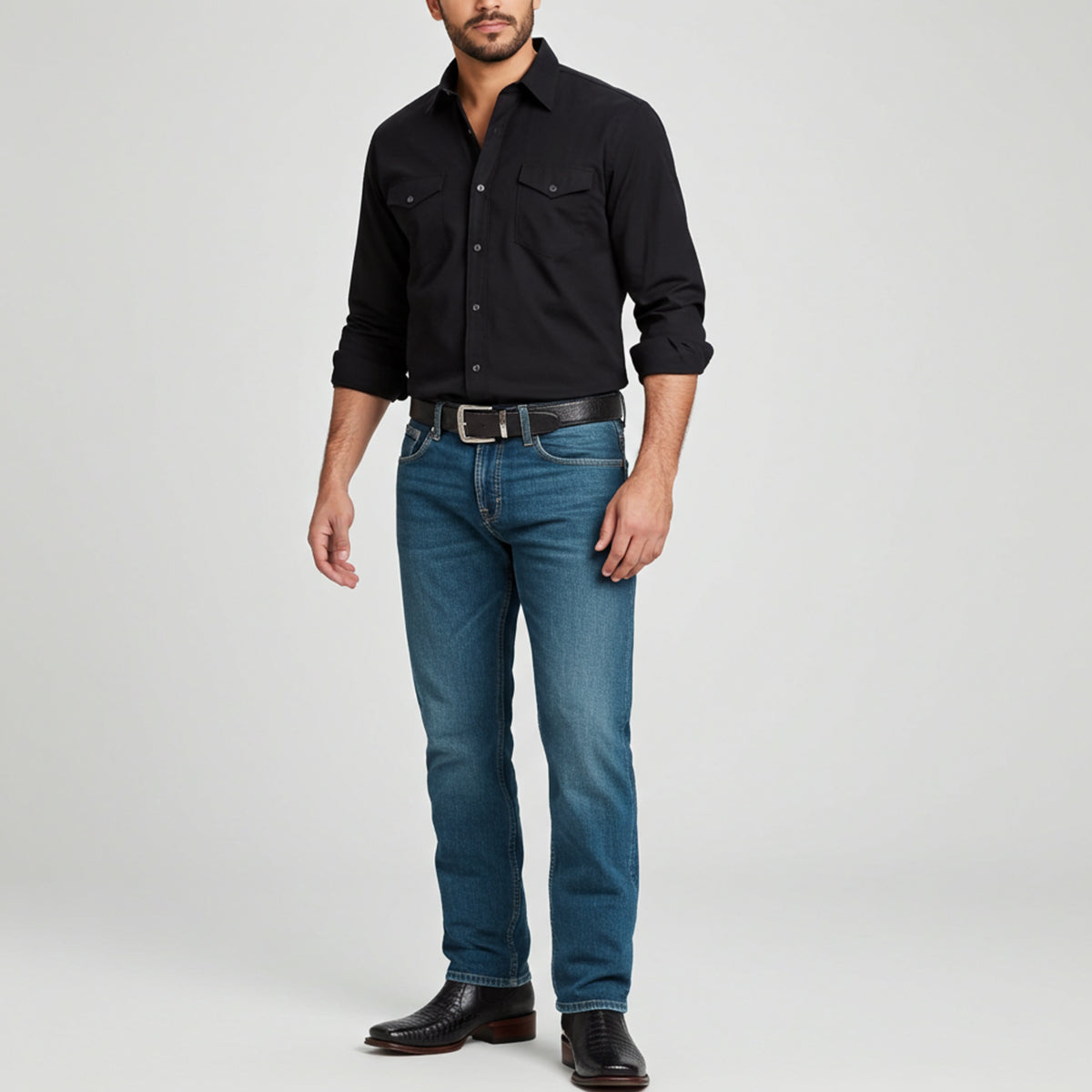 Man wearing black caiman square toe boots